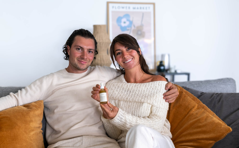 Anton and Audrey founders of Nima Organics holding natural scalp treatment oil